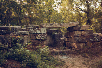 Dolmen in Russia Caucas. Forest in the city near Novorossiysk the sights are dolmens and ruins of ancient civilization. - obrazy, fototapety, plakaty