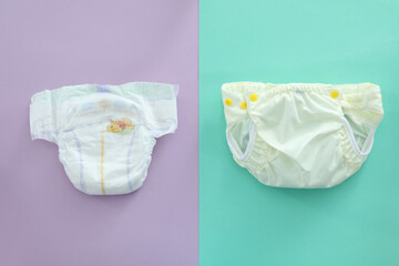 Reusable diapers on two-color background, close up