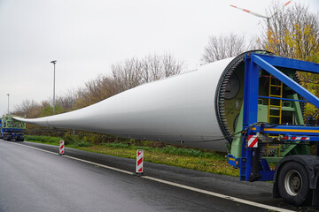 Transport of parts of a wind wheel with an extremely overlong heavy transport truck on the German A2 freeway, Hannover district, Germany, Europe.