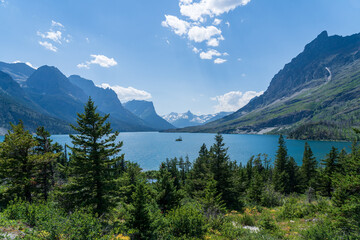Fototapeta na wymiar Wild Good Island Lookout at Saint Mary Lake in Glacier National Park by the Going to the Sun Road on a sunny summer day