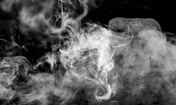 White smoke on a dark black background