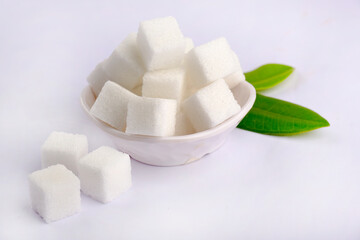 Sugar cubes.Cube sugar background, Sugar cubes in white bowl, isolated on white background.