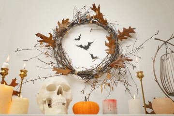 Different Halloween decor on table indoors. Festive interior
