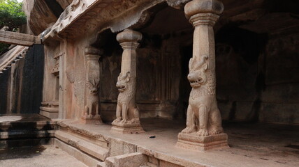 Cave stone hall carved in the rock in which the lion-shaped stone pillar