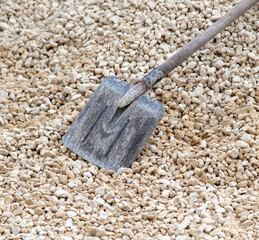 Shovel on gravel at a construction site.