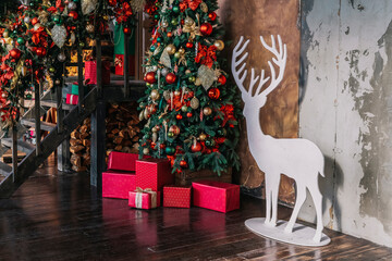 Stacks of Christmas presents under a Christmas tree