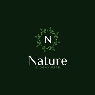 Eco-friendly concept round leaf vector logo design organic leaf logo luxury leaf graphic