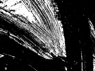 Grunge is black and white. Texture of black strokes on a white background. Abstract chaotic movements with a dry brush. Monochrome pattern of worn surface