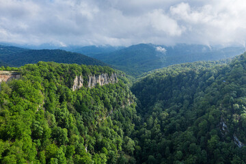 The Great Caucasian Ridge. Navalishinsky Canyon (White rocks). Subtropical forest. Aerial view.