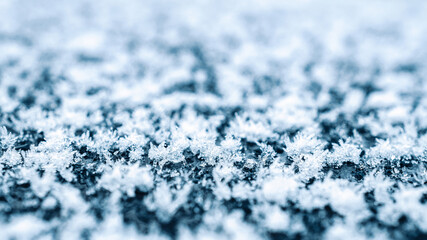Frost texture. Cold snow winter background. Blue crystal frozen abstract pattern. White frost ice texture.