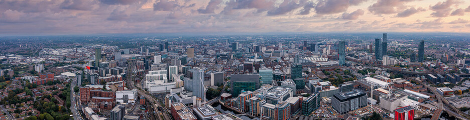 Fototapeta premium Aerial view of Manchester city in UK on a beautiful sunny day.