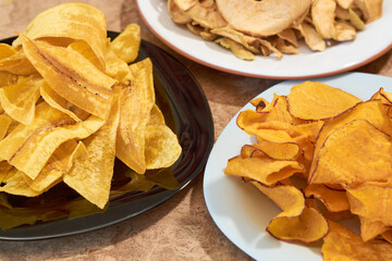 Set of different healthy dehydrated fruit chips.