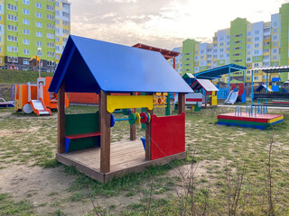 Fototapeta na wymiar Children's playground. Slide for children, sandbox, gazebo. Equipped children's playground