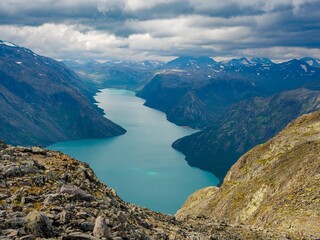 Naklejka na ściany i meble View of lake gjende from the famous Besseggen hiking trail, Norway