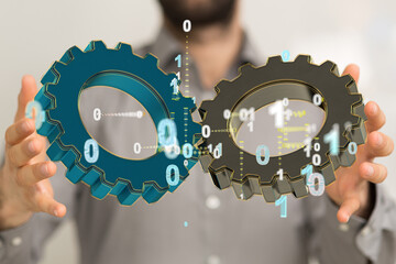 Man draws gears on virtual screen. Blurred Abstract engine room..