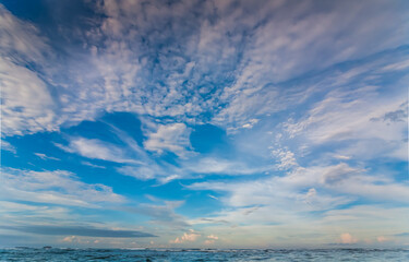 Summer landscape with sea and sky with clouds on the coast of the Indian Ocean in Sri Lanka