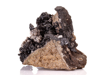 Macro stone groutite mineral on white background