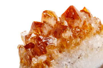 Macro mineral stone Citrine in rock in crystals on a white background