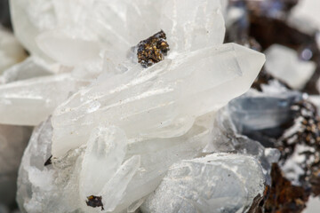 Macro mineral stone Drusus quartz with sphalerite in the rock a white background