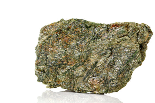 Macro stone mineral Diopside Calcite Magnetite on a white background