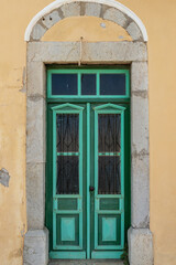 Colored door of a traditional Greek house on Symi island in Greece