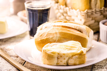 Bbread with butter and black coffee. Brazilian typical French bread with strong coffee cup, Brazilian breakfast