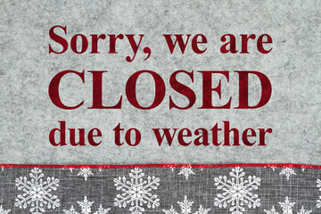 Closed due to weather sign gray and white snowflake border on gray felt material