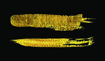 Golden brush stroke collection set on a black background or paintbrush	