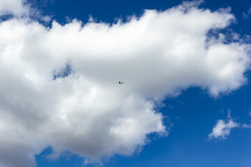 white fluffy cloud on blue sky background