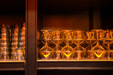 Wine glasses and glasses in a restaurant before service. Hotel cafeteria