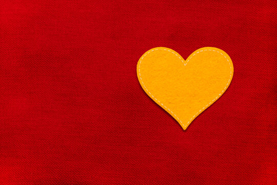 orange heart on a background.  The image of the heart. core, soul, bosom, ticker