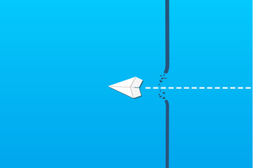 Concept of overcoming barriers on the way to goal, target, with white paper airplane breaking through obstacle on blue background.