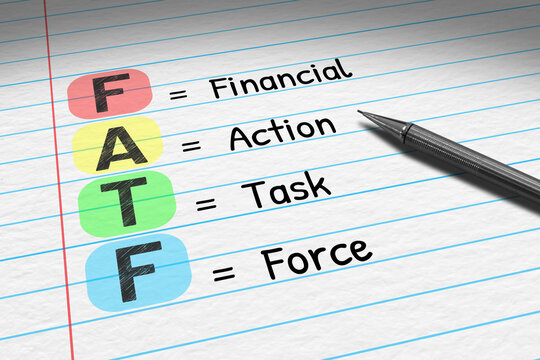 FATF - Financial Action Task Force. Business acronym on note pad.
