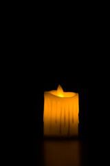 Christmas advent candle light in dark background well used for religious ritual, spiritual   zen...