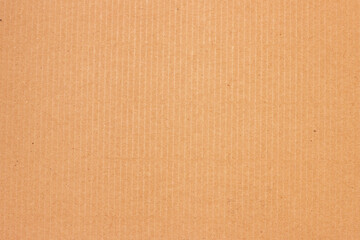 A sheet of brown cardboard. Paper natural texture.