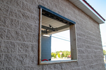 A bird perched view through a window