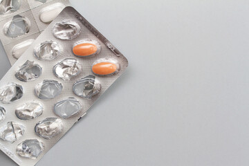 Medical pills on gray background. Flat lay Top view composition.
