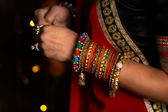 Woman hand with bangles 
