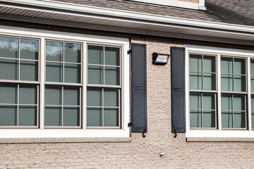 Modern brick architecture black trim glass windows