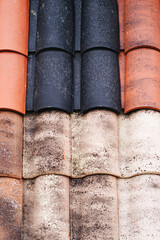 Background, samples, old ceramic and cement-sand tiles for the roof of the house. Building...