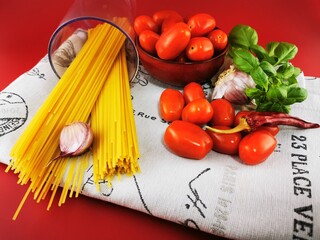 Pasta with tomatoes and garlic. Ingredients for cooking, Homemade Pasta.