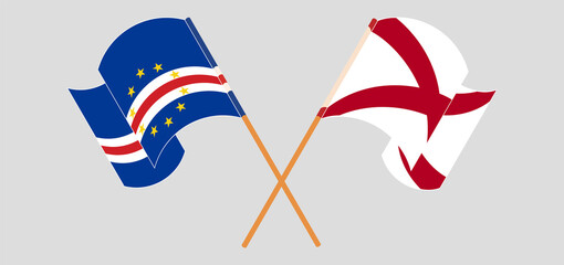 Crossed and waving flags of Cape Verde and The State of Alabama