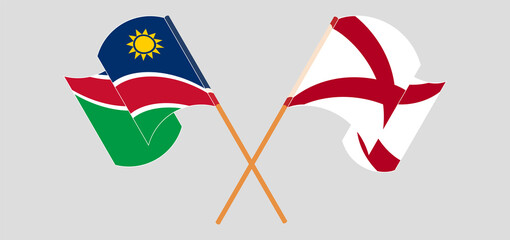 Crossed and waving flags of Namibia and The State of Alabama