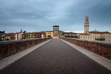 The famous Stone Bridge (Ponte di Piettra) over Adige river in Verona old town at sunrise, Verona,...