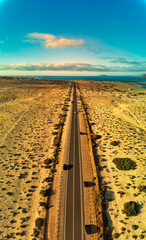 Fototapeta premium Aerial panoramic view of the road between Flag Beach and the Parque Natural Fuerteventura