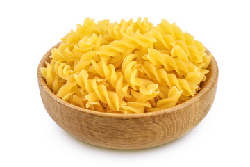 raw Fusilli pasta in wooden bowl isolated on white background with clipping path and full depth of field