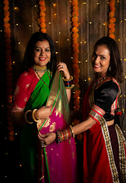 Women admiring silk sari 