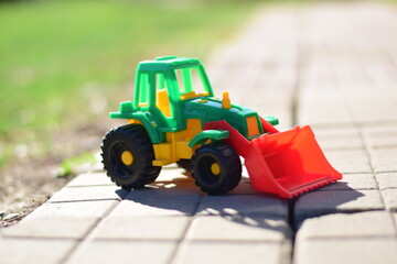 tractor, toy, truck, car, vehicle, construction, machine, isolated, equipment, farm, bulldozer, machinery, yellow, red, agriculture, model, wheel, industry, agricultural, transportation, transport, pl