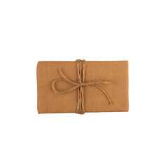 A brown paper wrapped gift isolated on a white background. Christmas gift composite