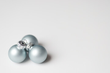 Light blue cosmic balls for Christmas decoration on white background.